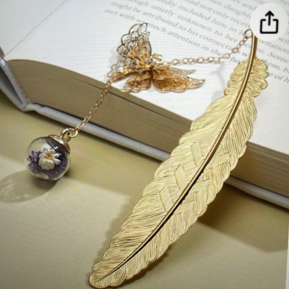 Metal feather Bookmark with butterfly charm and flower in ball.